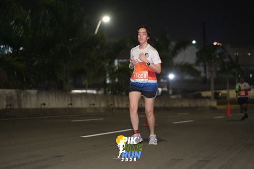 Race photo from PIK NITE RUN 2025