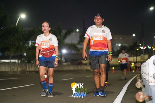 Race photo from PIK NITE RUN 2025