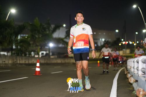 Race photo from PIK NITE RUN 2025