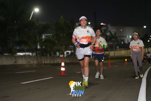 Race photo from PIK NITE RUN 2025