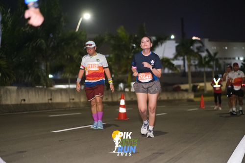 Race photo from PIK NITE RUN 2025