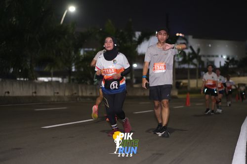 Race photo from PIK NITE RUN 2025
