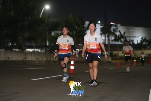 Race photo from PIK NITE RUN 2025
