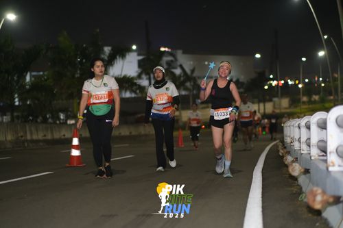Race photo from PIK NITE RUN 2025