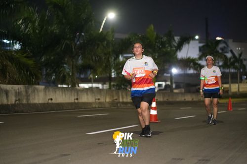 Race photo from PIK NITE RUN 2025