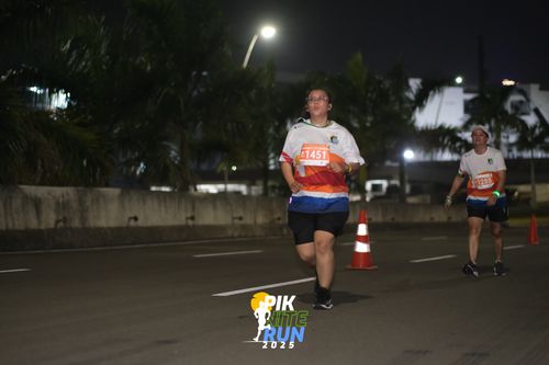 Race photo from PIK NITE RUN 2025