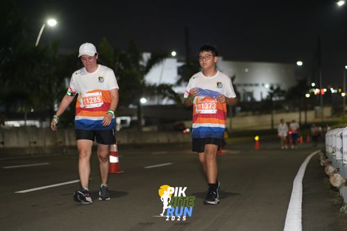 Race photo from PIK NITE RUN 2025