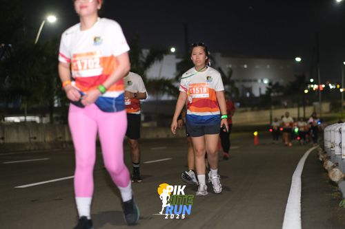 Race photo from PIK NITE RUN 2025