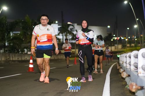 Race photo from PIK NITE RUN 2025