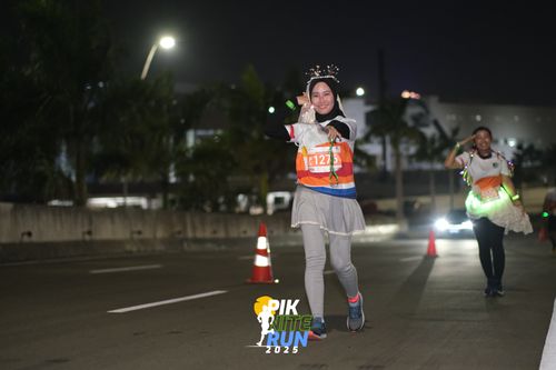 Race photo from PIK NITE RUN 2025