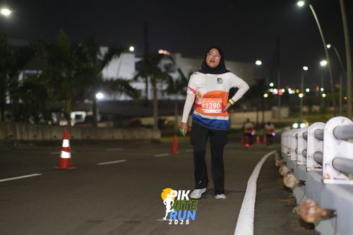 Race photo from PIK NITE RUN 2025
