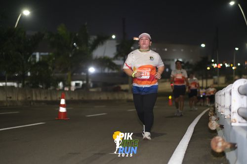 Race photo from PIK NITE RUN 2025