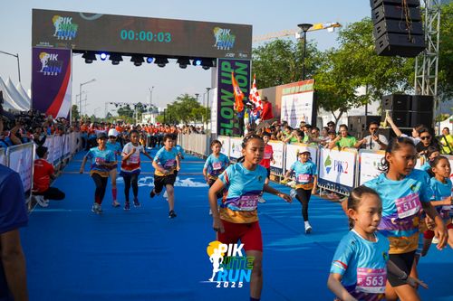 Race photo from PIK NITE RUN 2025