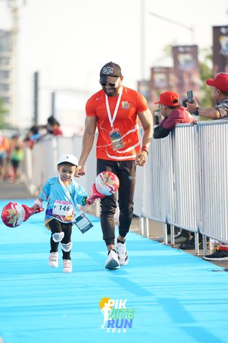 Race photo from PIK NITE RUN 2025