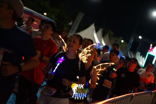 Race photo from PIK NITE RUN 2025