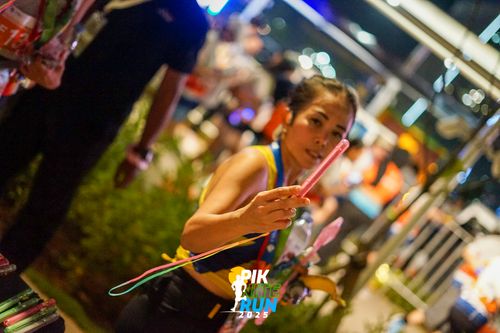 Race photo from PIK NITE RUN 2025