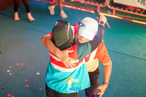 Race photo from PIK NITE RUN 2025
