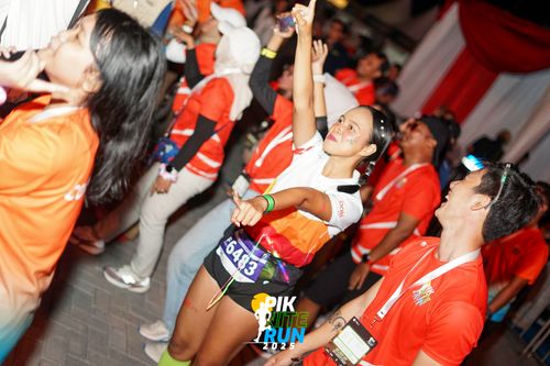 Race photo from PIK NITE RUN 2025