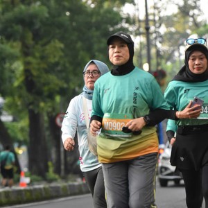 Race photo from BAUR RUN 2025