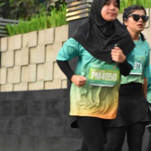 Race photo from BAUR RUN 2025