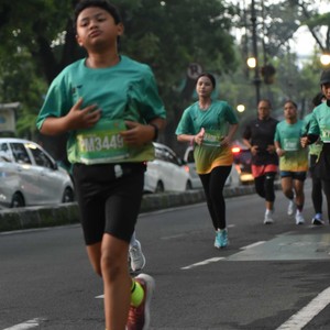 Race photo from BAUR RUN 2025