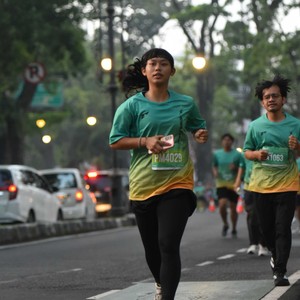 Race photo from BAUR RUN 2025