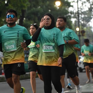 Race photo from BAUR RUN 2025