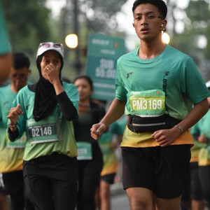 Race photo from BAUR RUN 2025