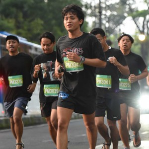 Race photo from BAUR RUN 2025