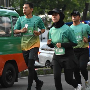 Race photo from BAUR RUN 2025