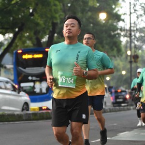 Race photo from BAUR RUN 2025