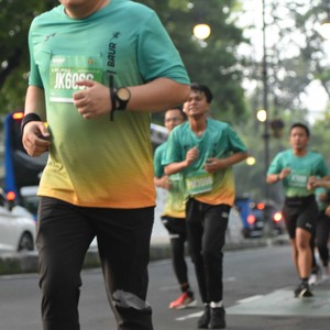 Race photo from BAUR RUN 2025