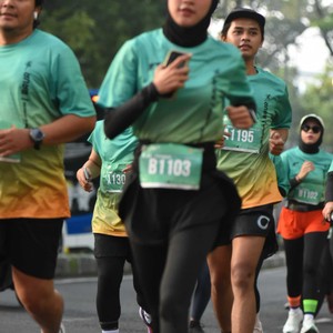 Race photo from BAUR RUN 2025