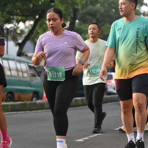 Race photo from BAUR RUN 2025