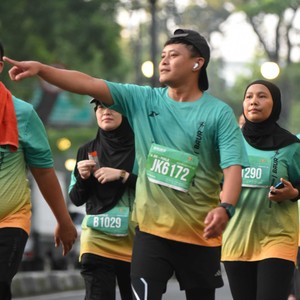 Race photo from BAUR RUN 2025