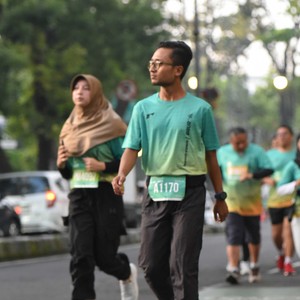 Race photo from BAUR RUN 2025