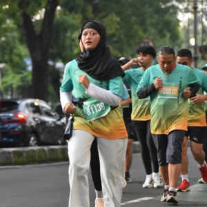 Race photo from BAUR RUN 2025