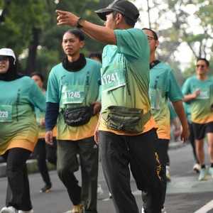 Race photo from BAUR RUN 2025