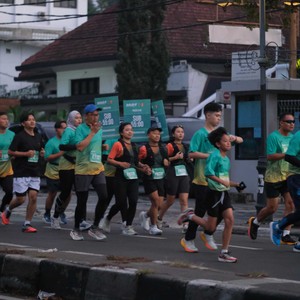 Race photo from BAUR RUN 2025