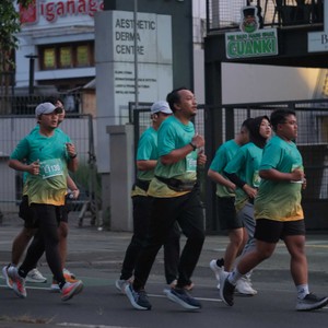 Race photo from BAUR RUN 2025