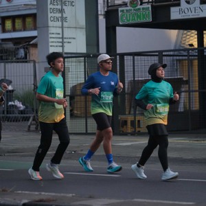 Race photo from BAUR RUN 2025