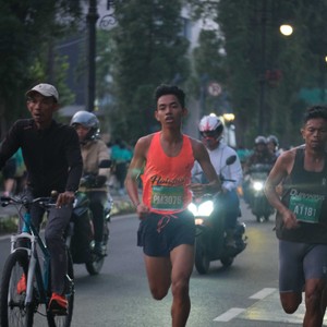 Race photo from BAUR RUN 2025