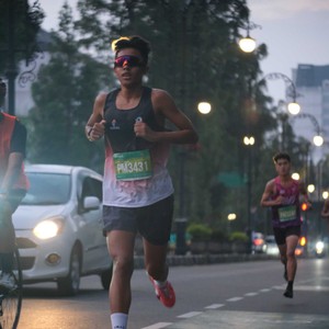 Race photo from BAUR RUN 2025