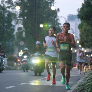 Race photo from BAUR RUN 2025
