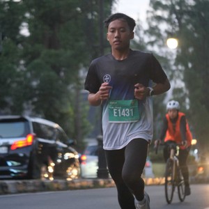 Race photo from BAUR RUN 2025