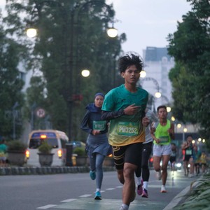 Race photo from BAUR RUN 2025