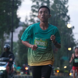 Race photo from BAUR RUN 2025
