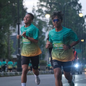 Race photo from BAUR RUN 2025