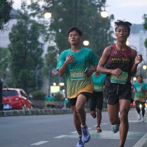 Race photo from BAUR RUN 2025