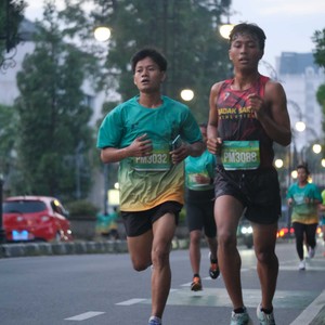 Race photo from BAUR RUN 2025